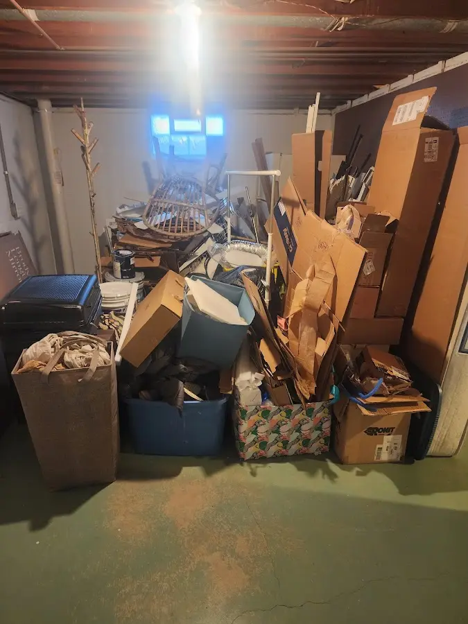 Roll-off dumpster container at job site for Yard Waste Dumpster Rental in Plainview